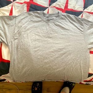 2 grey long sleeve shirts